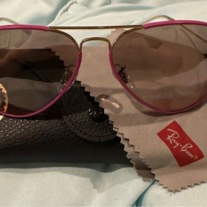 Women’s lightly used Ray-Ban aviators with hot pink trim